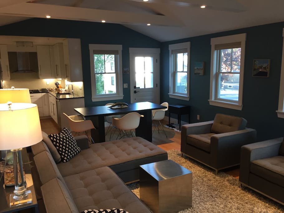 Open entertaining space with a table that accommodates six people.