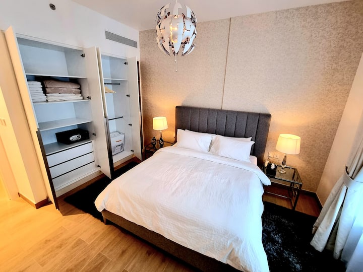 Solid king-size bed for 2 in a spacious bedroom. The wardrobe contains 16 hangers with solid shoulders, towels, throw blankets and a safe.