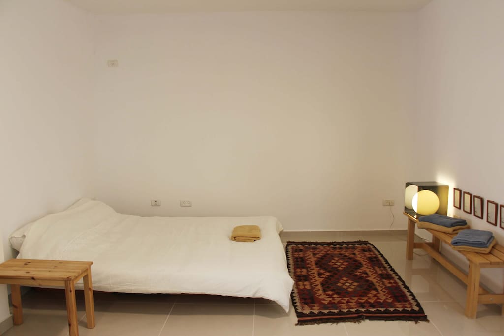 Queen Size Bed with white linen