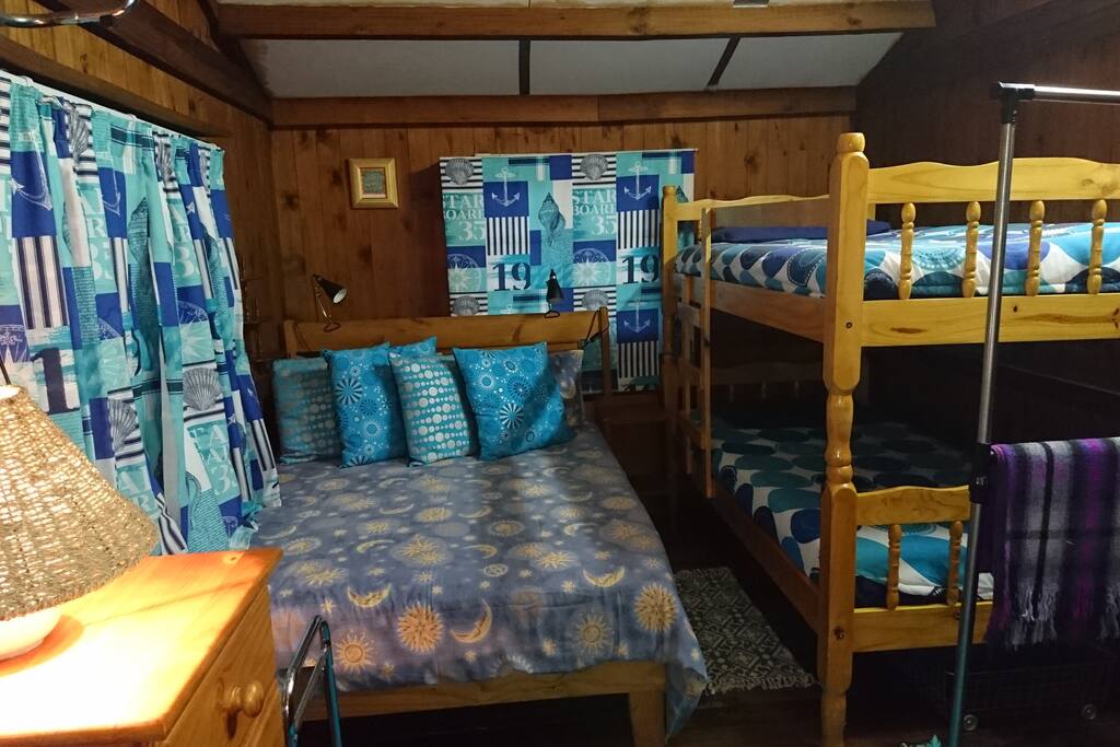 Sleeps 2 adults (double bed) and 2 kids (bunk bed)