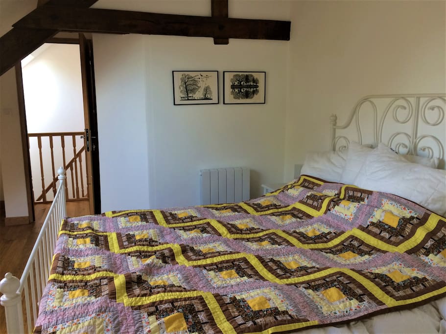 One of the top floor bedrooms, with ensuite bathroom.
