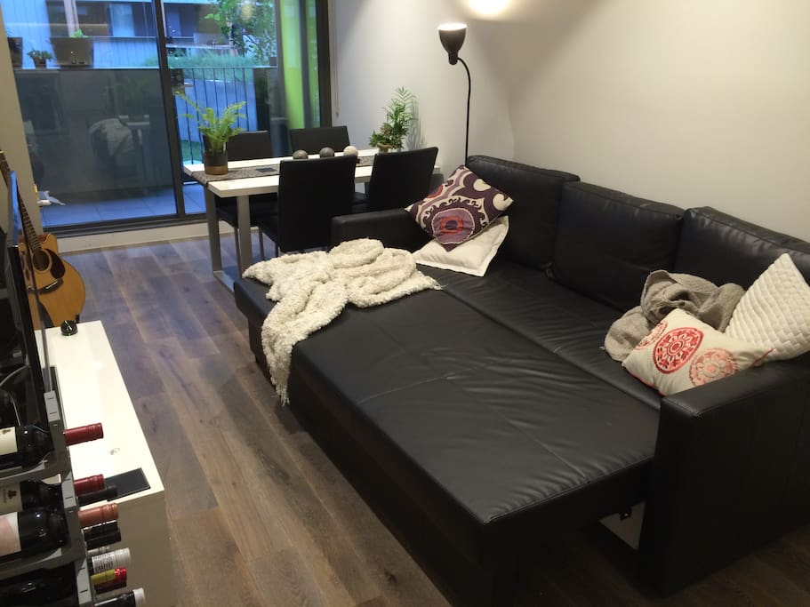 The sofa bed handily folds out and can be made up with provided sheets and pillows. It's surprisingly comfortable, and can accomodate a couple or a single. But, you should fight for the main bed, because that's just lovely to sleep in.
