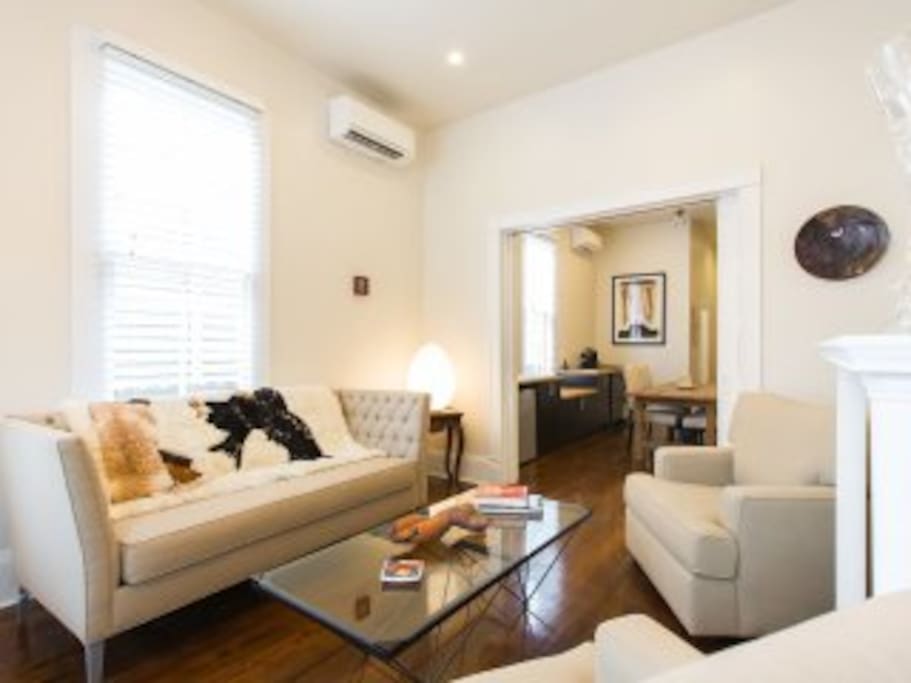 High ceilings, original hardwood floors, mantels, pocket doors and lots of natural light