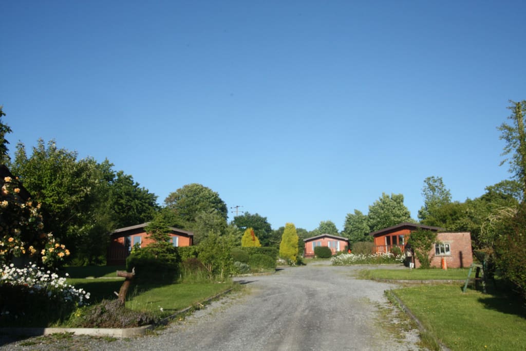 The cabins are set in a peaceful rural location, yet only a 10 minute walk to Penbryn National Trust Beach.