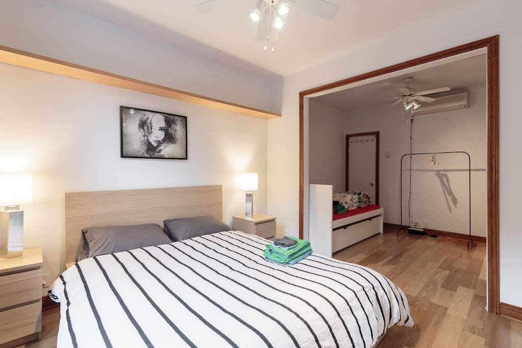 Queen size in larger bedroom