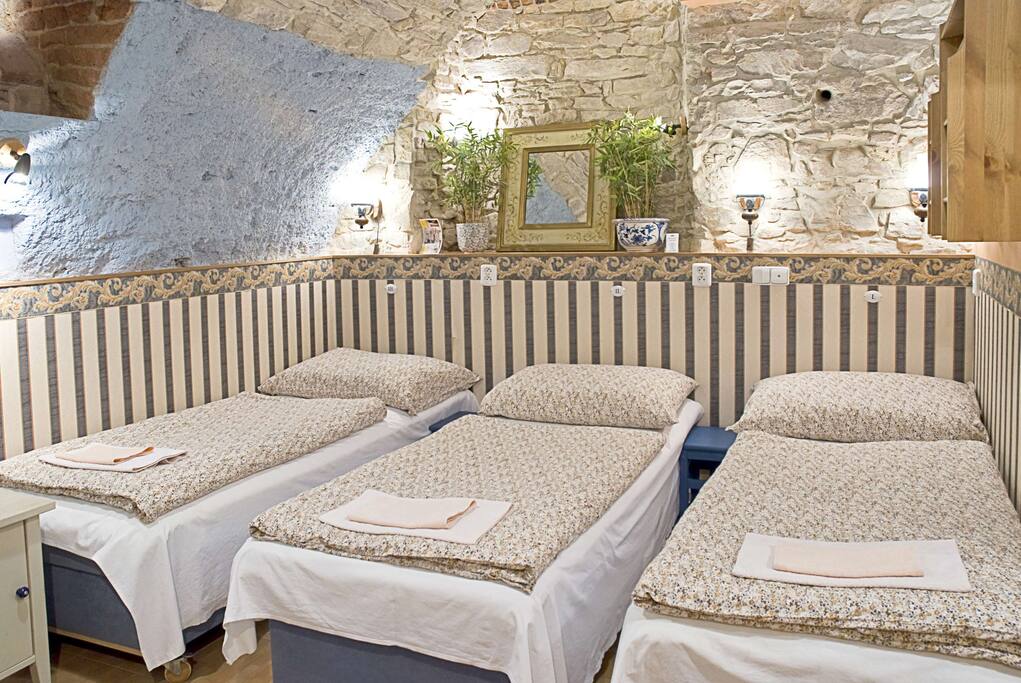 4 single beds in the bedroom (only 3 in picture)