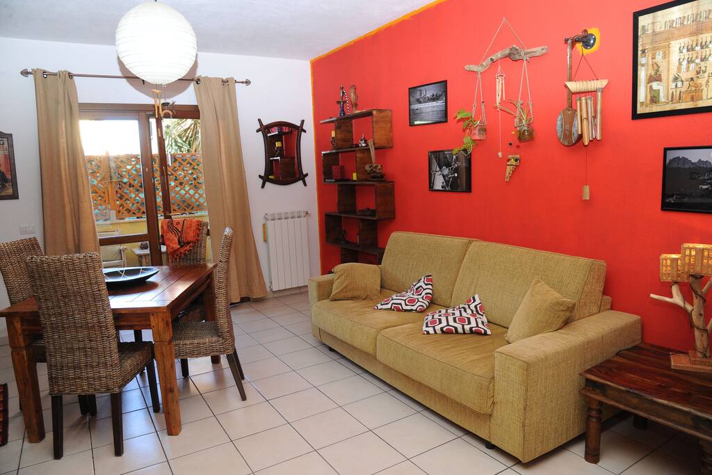 Soggiorno con accesso a veranda coperta