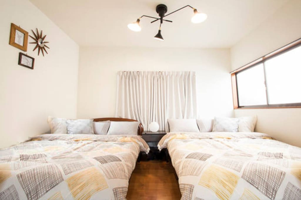 Bedroom with 2 double beds on 2F.