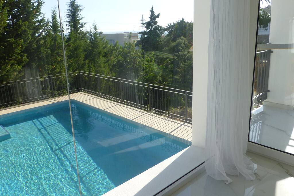 Vista a Piscina desde Salón