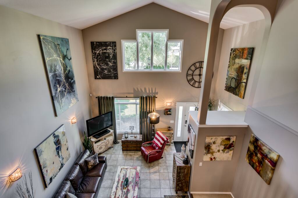 view of lower level living area from top floor