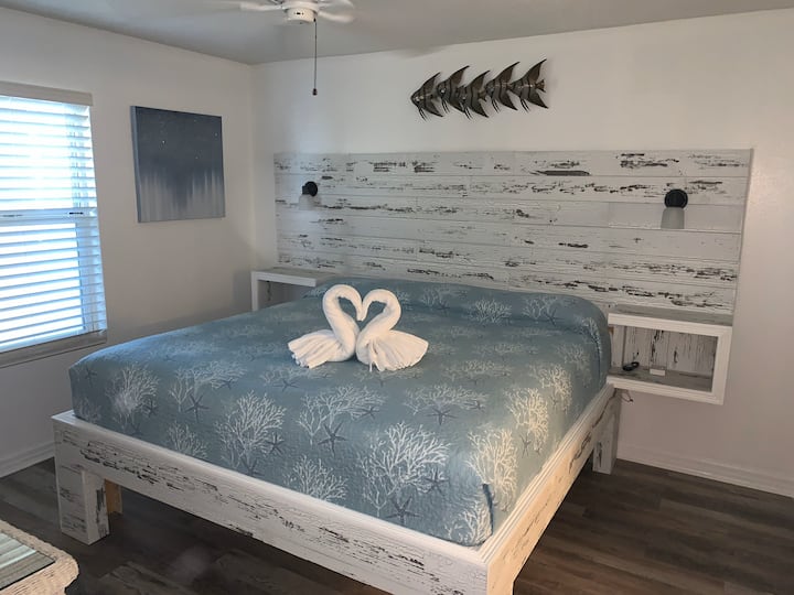 Impeccable maid service thanks to Resorts Of Pelican Beach beach . 
Master bedroom has 55” smart tv . 
Bed custom made. Slide up to 6 large suit case under bed. Extra luggage stands . 
All beds have usb plugs 