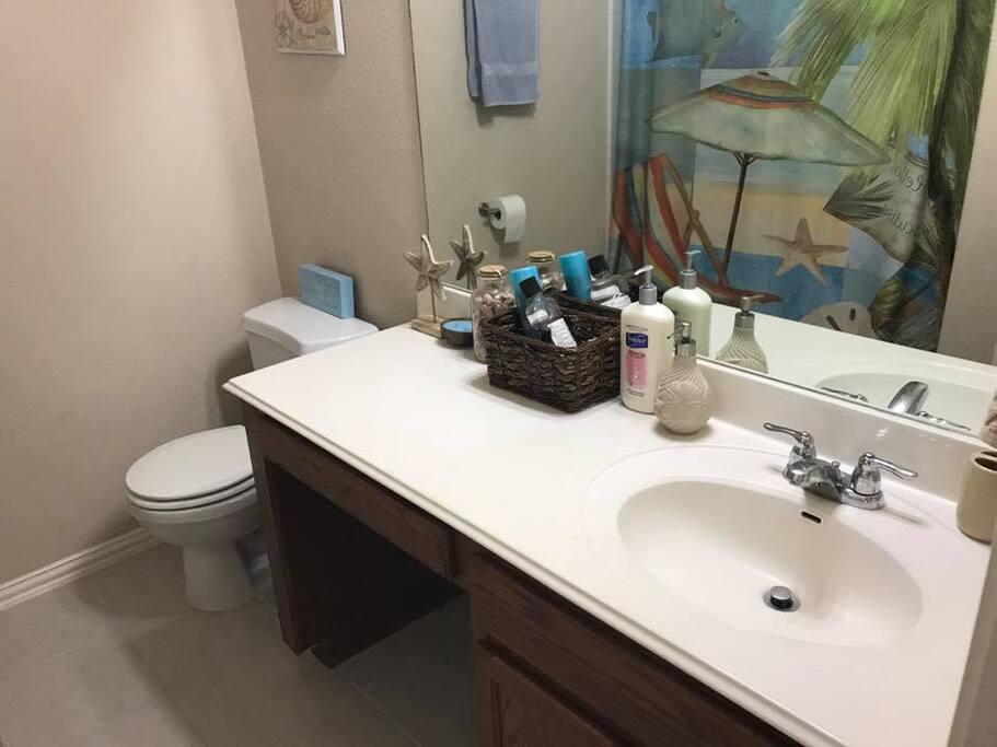 Private bathroom right next to the guest room. Sundries available.