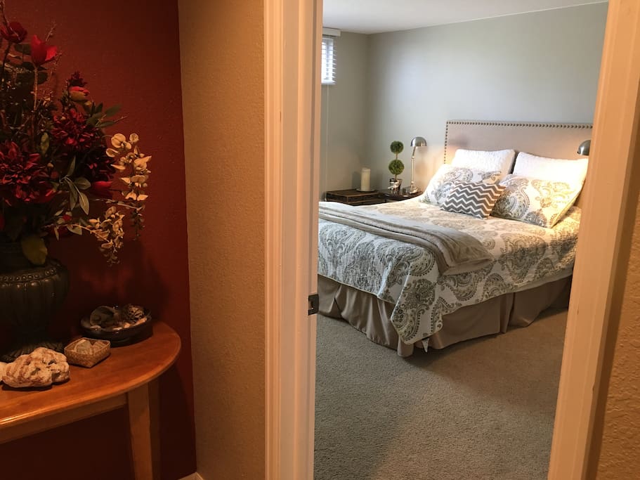 This is the entrance into the "Gray Room", one of 2 available bedrooms with a Queen Bed. Large egress window faces our south pasture.