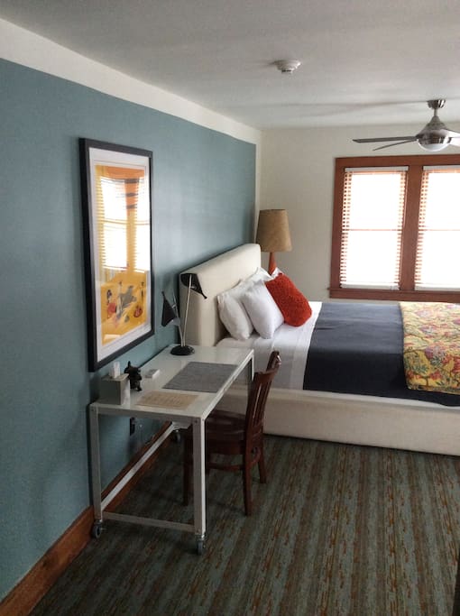 Room 203 desk and bed.
