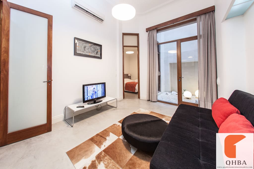 Minil living with acces to groundfloor suite, patio and and small living all at the backside