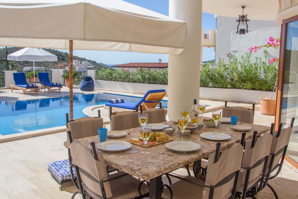 Enjoy lunch overlooking the private pool