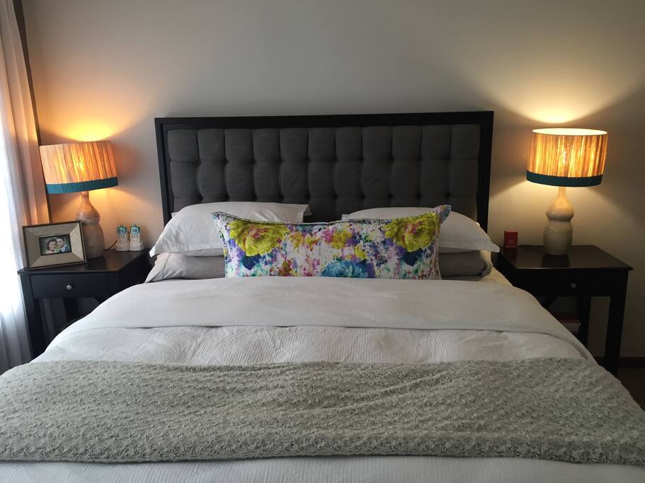 Main bedroom which has an air conditioning unit as well as Built in cupboards, dressing table and king size bed with lovely Egyptian cotton bedding and a feather duvet.