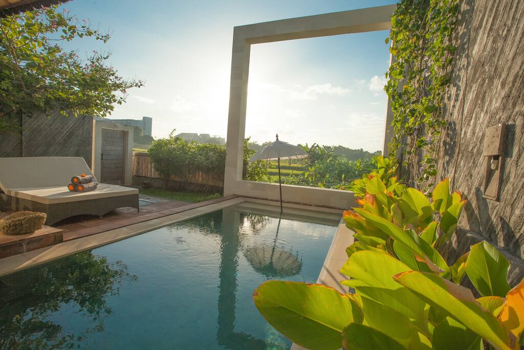 Infinity pool in middle of Petitenget - Unique view on the rice field