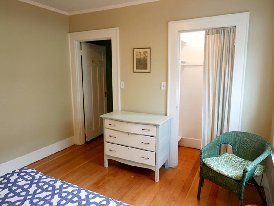 Cozy guest bedroom with closet.