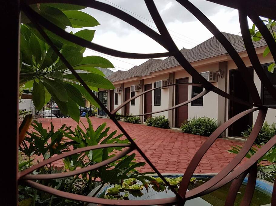 Paved court parking space. View from our restaurant kusina gliceria