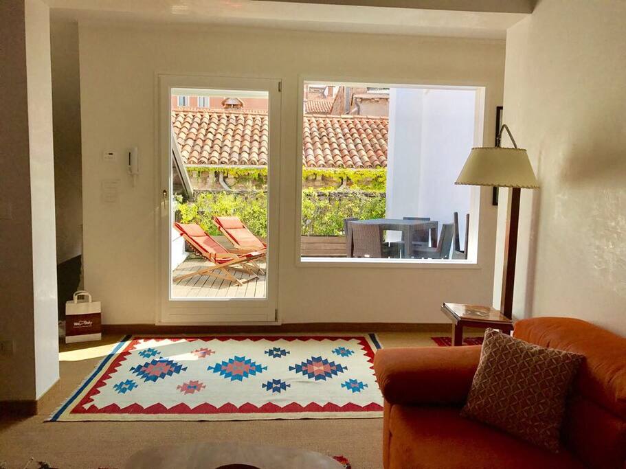 View to sun deck terrace from living room