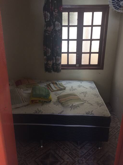 Quarto com cama de casal