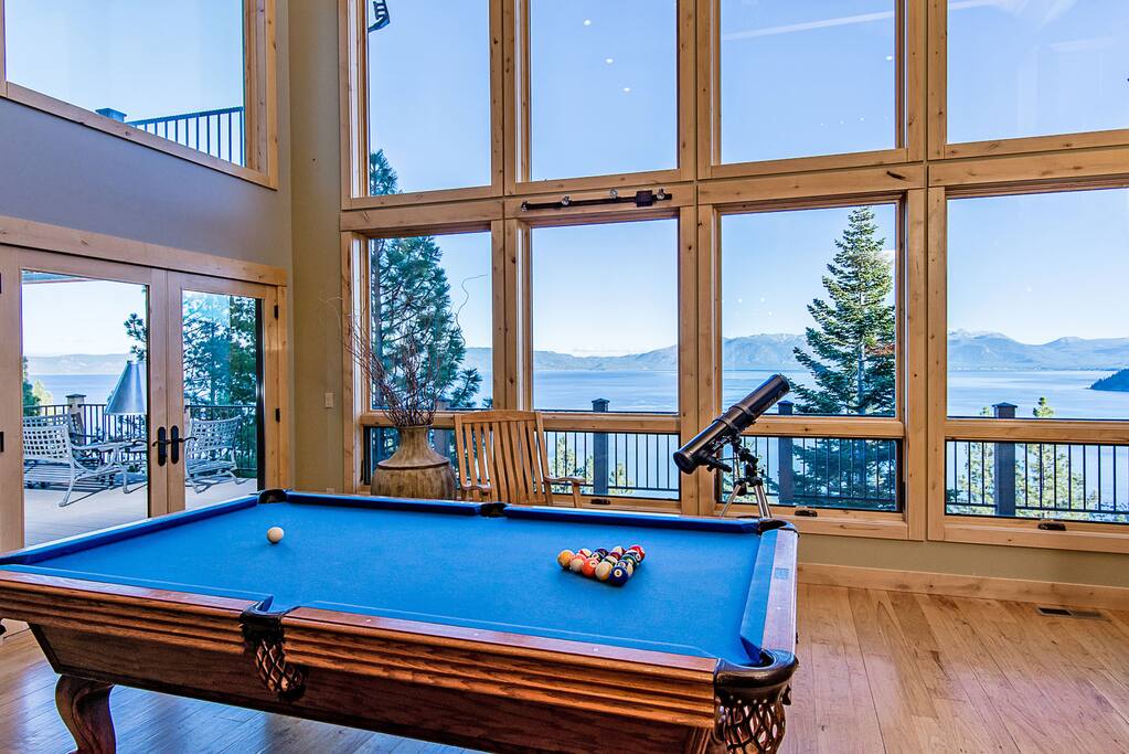 Play a game of pool or look out on the lake in a second living area.