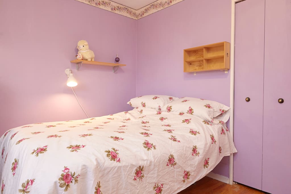 A closet next to the bed.