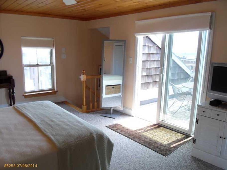 Deck off the master bedroom; very sunny & bright