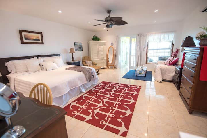 Large guest bedroom has its own sitting area, desk for make up or computer work, television, books and games and ensuite bathroom and small kitchen.