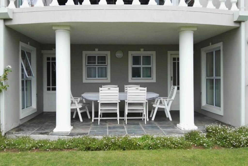 Outside patio for guests only with entrance to rooms.