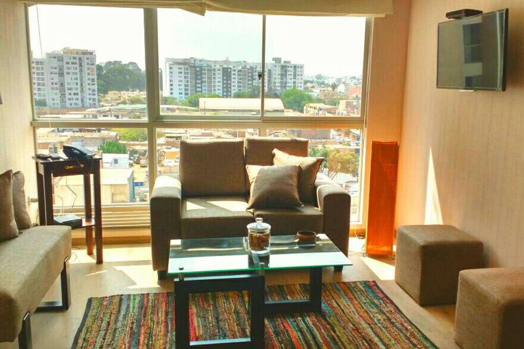 Salón principal con 01 Sofá Cama