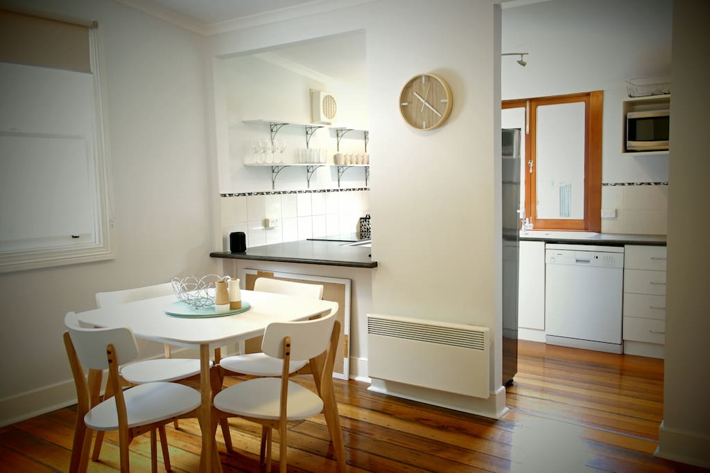 Spacious dining / living room with modern furniture