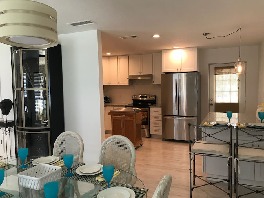 Dining room with stainless appliances