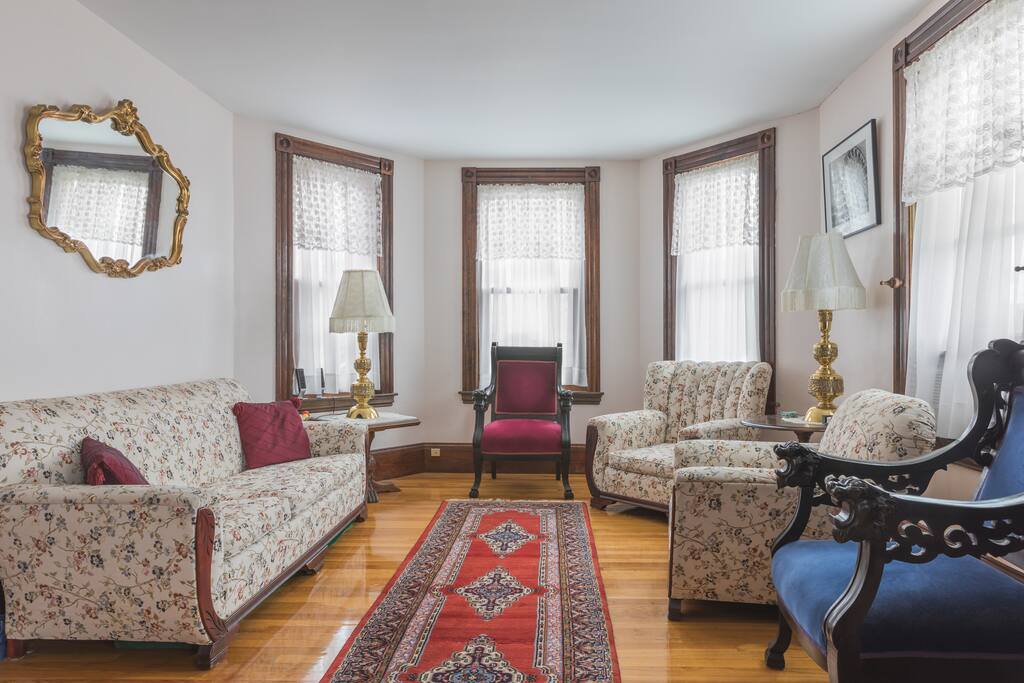 Parlor furnished for comfort. A great reading spot.