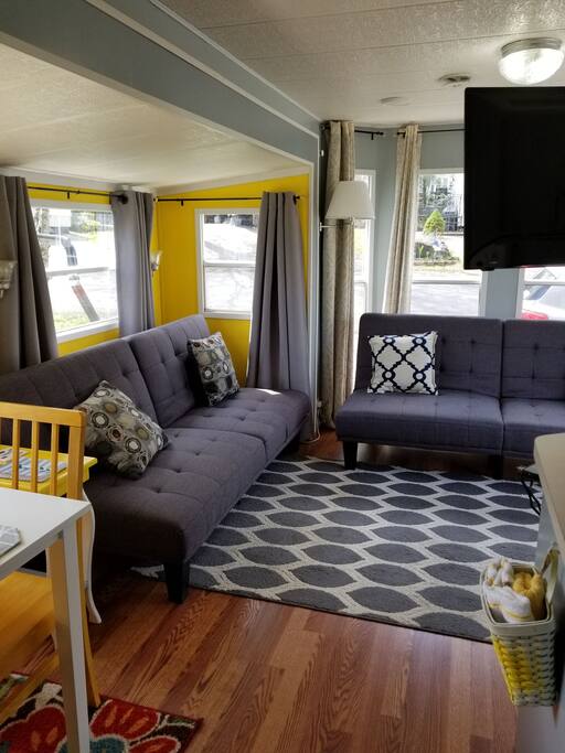 Two click clack futons that convert to full size beds