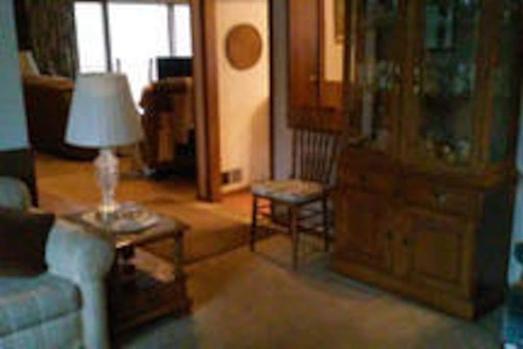 To the kitchen and fireplace room.