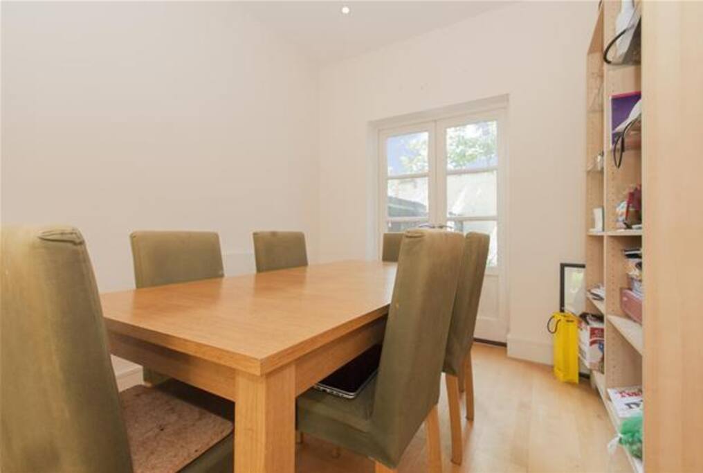 Dining room with patio doors into the back garden.