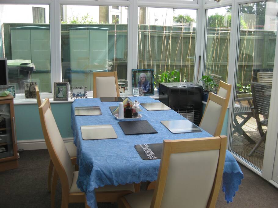 This is the dining room which also has 2 sofa's for relaxing.