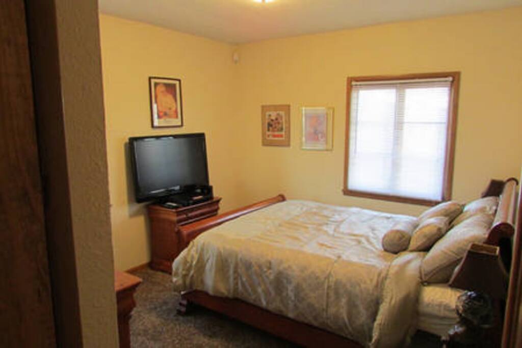 New mattress with elegant bedding and Flat Screen TV