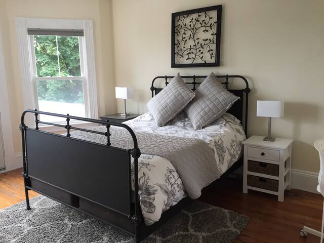 Spacious luxury bedroom with Boston view deck