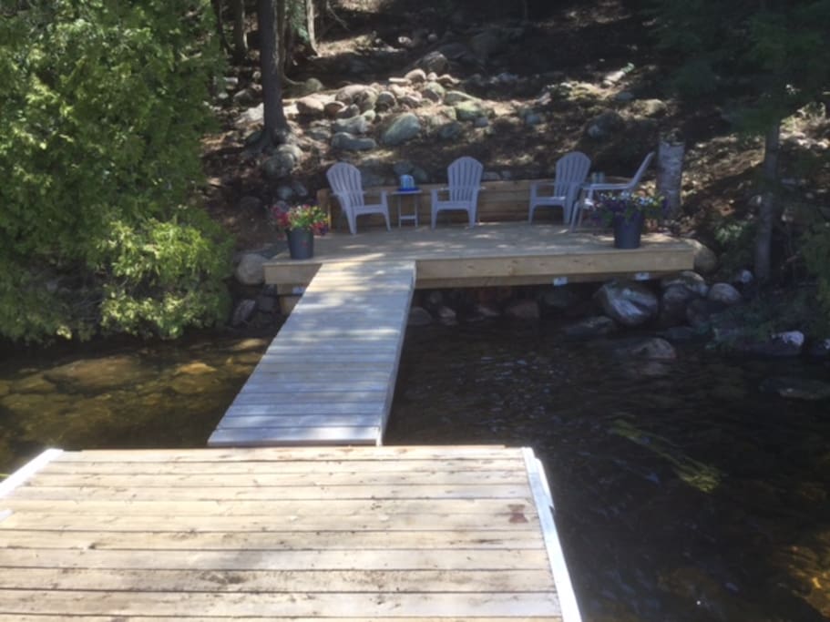 Dock and deck with plenty of sun and shade for your lakeside pleasure