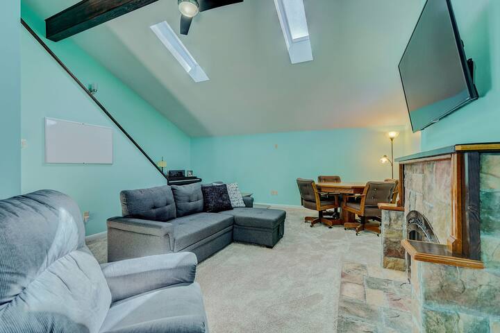 Comfortable family room off the entry, with a convertible sofa accommodating additional overnight guests