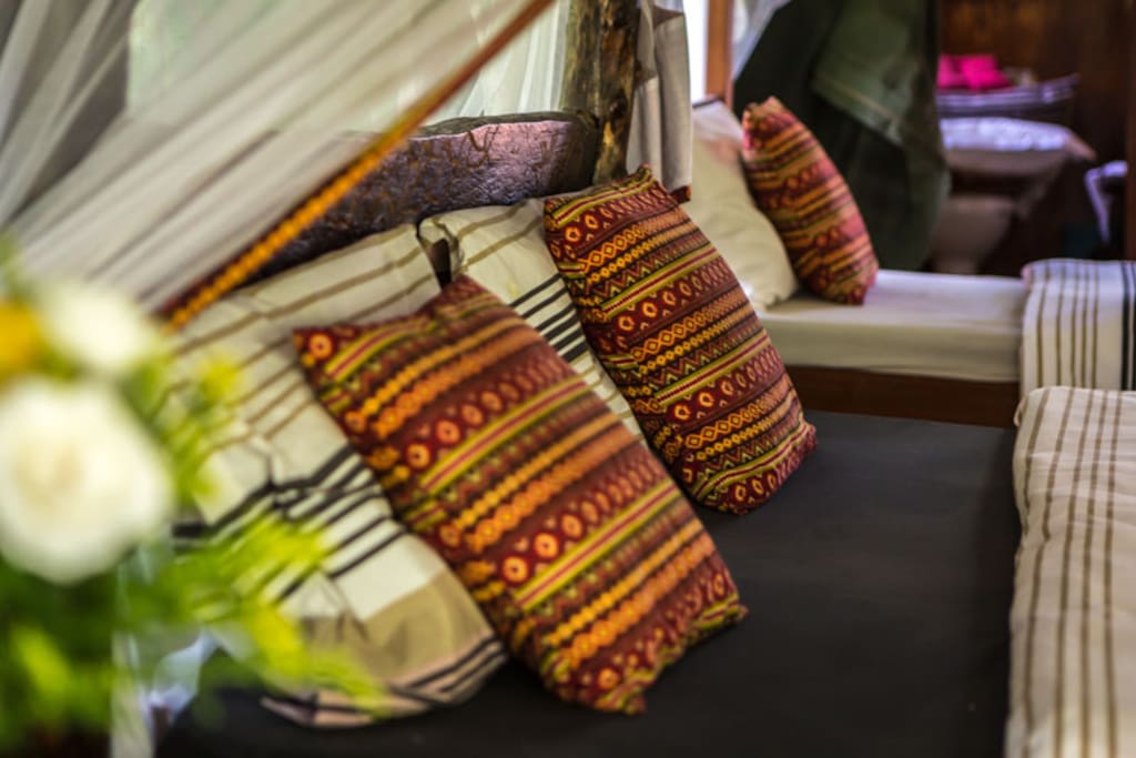 luxury tent with one double bed and one single bed // beautiful view to Talek river