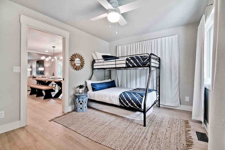 3rd bedroom has a bunk bed with a full sized bed on the bottom and a twin bed on the top with spacious closest storage and a twin trundle bed