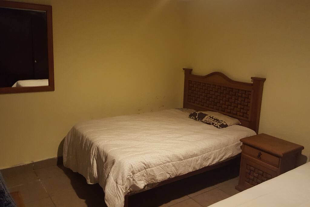 Cama queen size.
