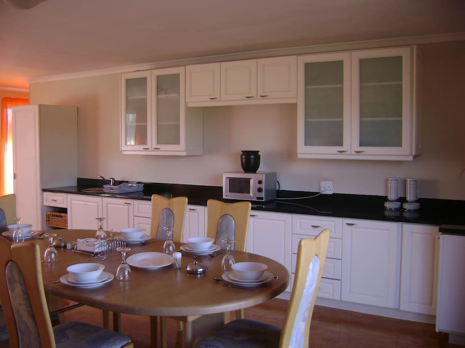 Communal kitchen where breakfast and coffee are served.