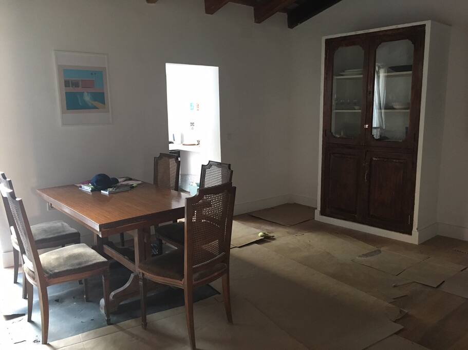Dining area with restored antique cupboard