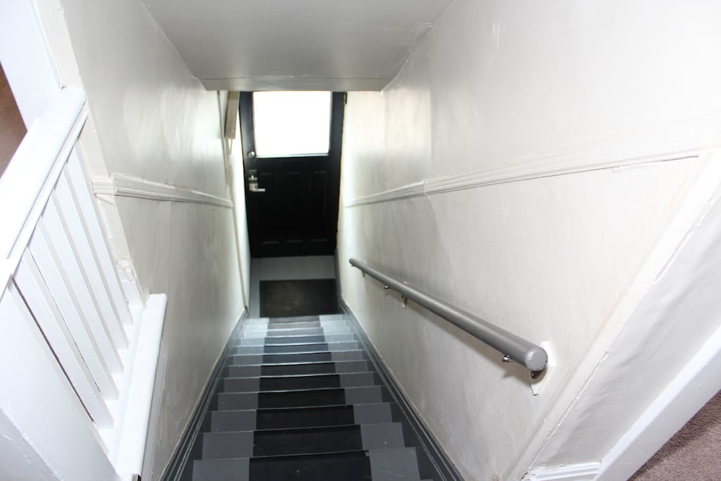 Private entrance and stairs up to the second floor apartment