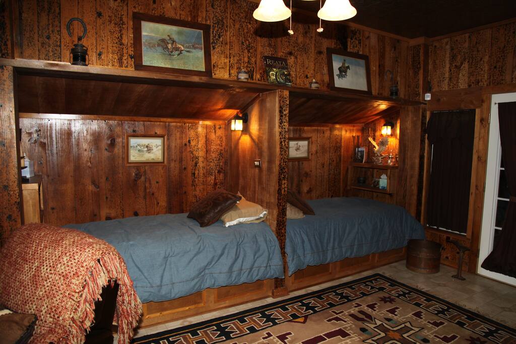 Two single beds by entrance of main door